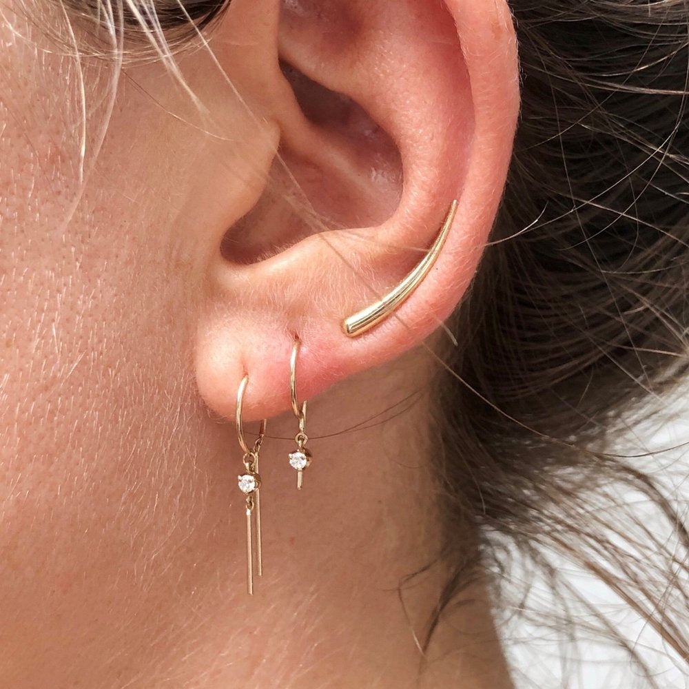 Close-up of Jack + G Diamond Chime Earring, minimalist gold drop with diamond