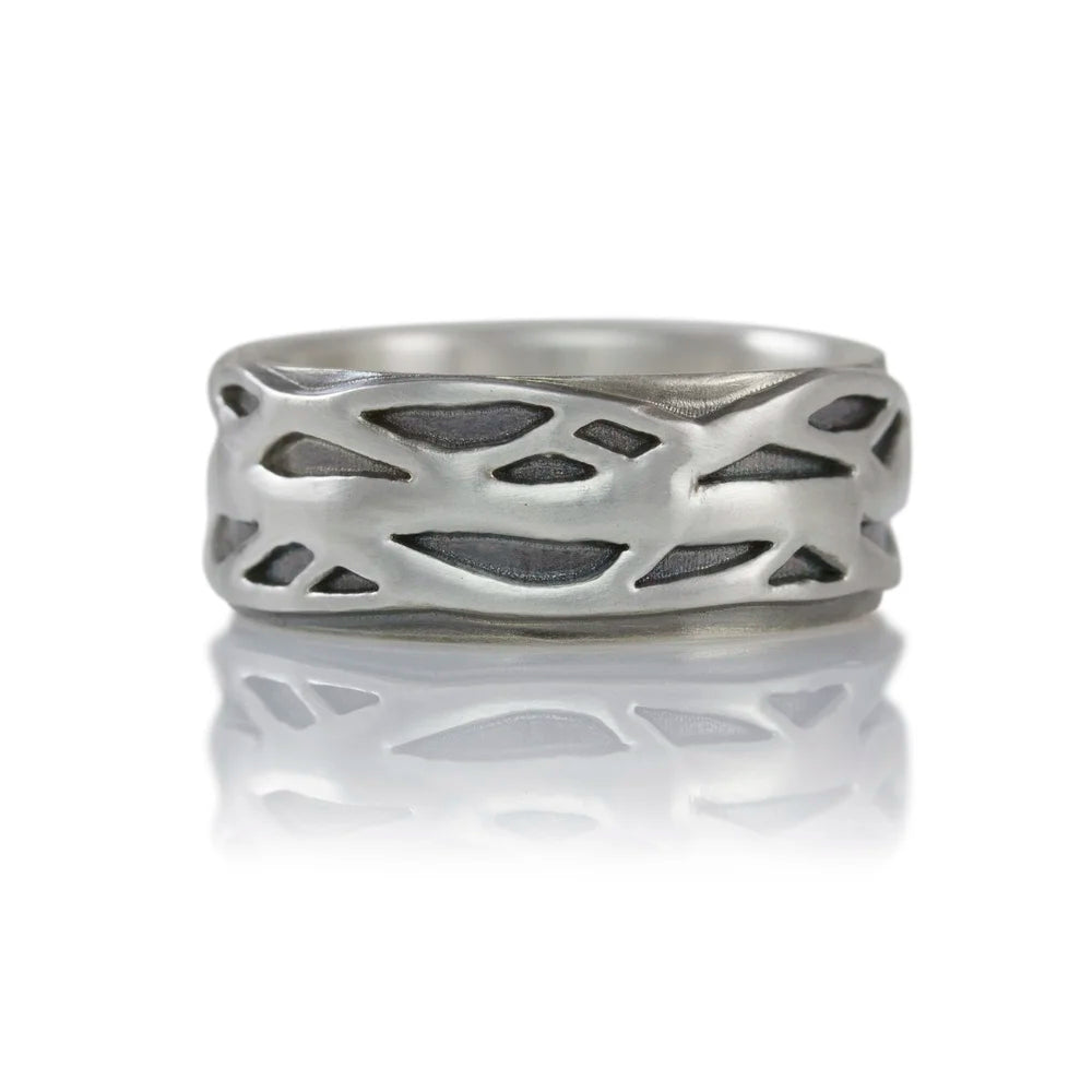 Willow Band Ring by Luana Coonen in oxidized sterling silver with lattice pattern on white background