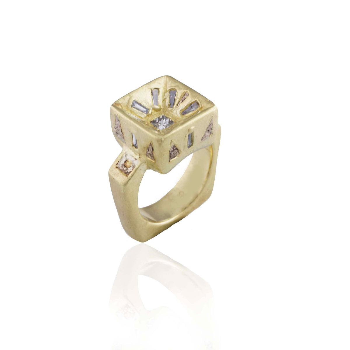 Angled profile of the one-of-a-kind Mesa Ring showing its substantial 14k gold band, raised square setting, and baguette diamond details.