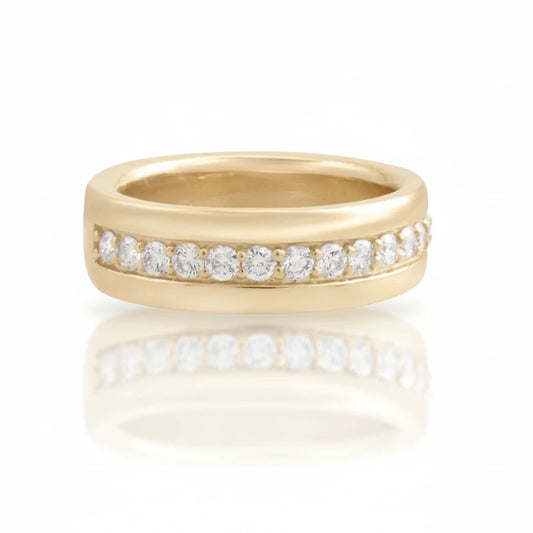 Michaela Farkasovska 14k yellow gold wedding band with a continuous row of round white diamonds and polished finish.