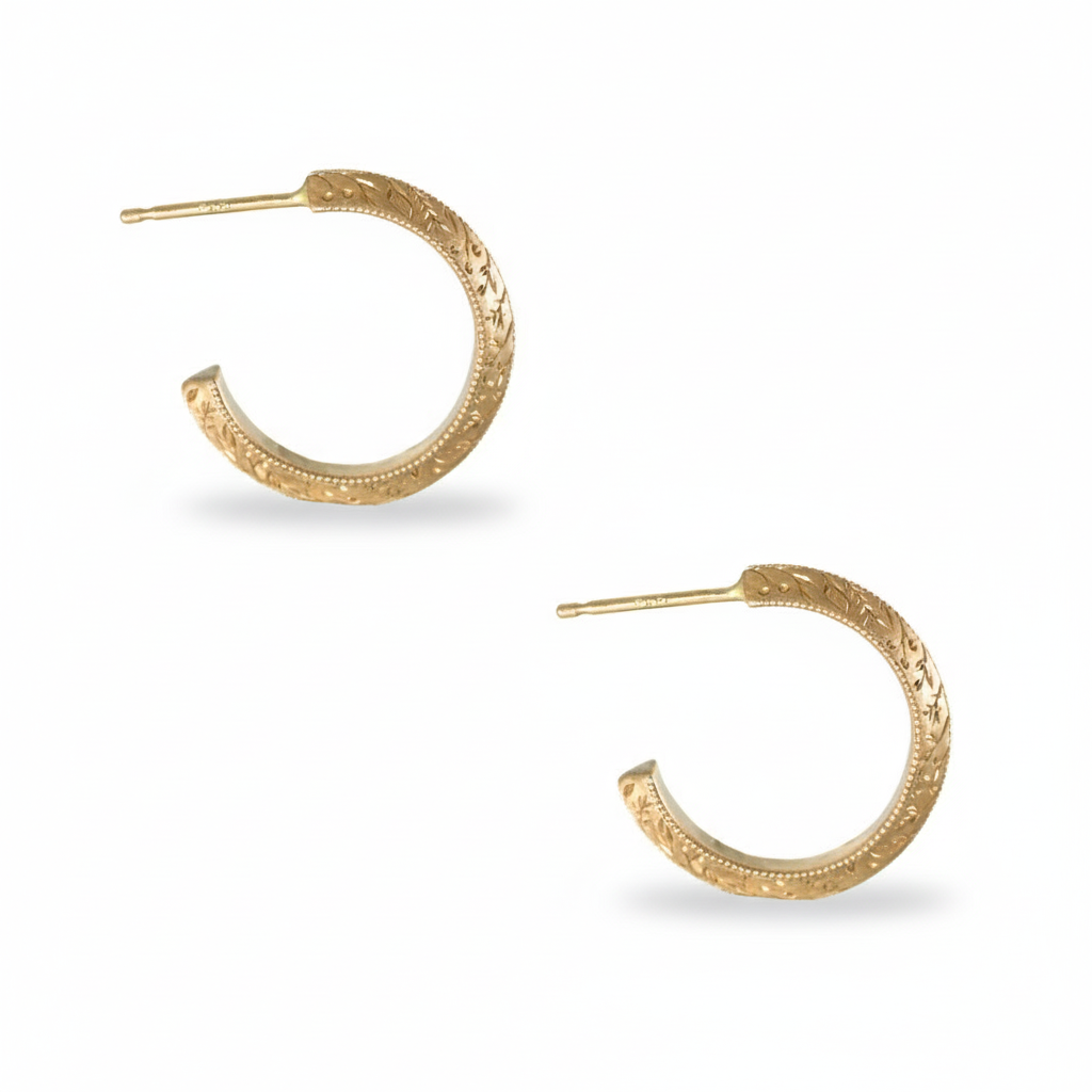 Two 14k gold hand-engraved floral hoop earrings shown in an open view on a white background.