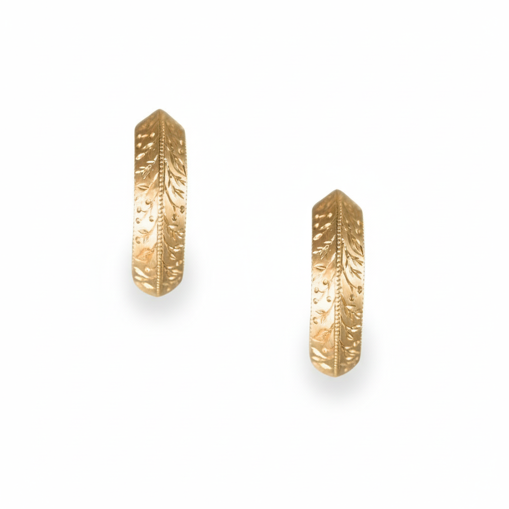Two side-view images of 14k gold hand-engraved floral hoop earrings on a white background.