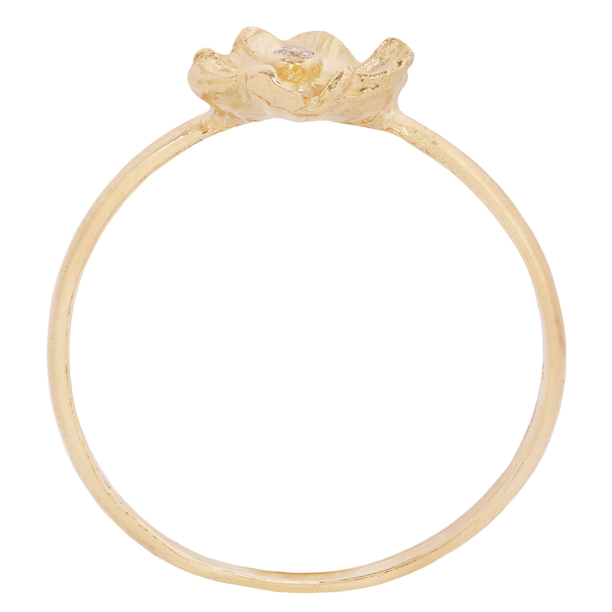 Side profile of the handcrafted 14k yellow gold Efflorescent Stacking Ring, showing its delicate gold band, raised sculptural flower, and natural diamond center.