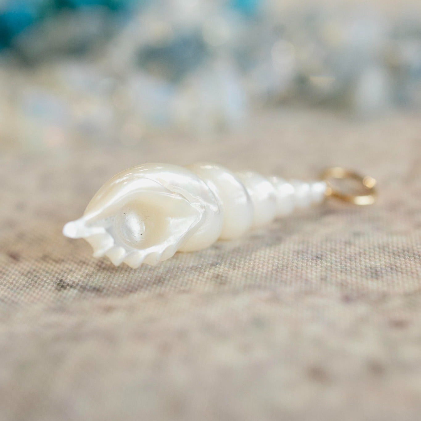 Spiral Shell Charm – Hand Carved Mother of Pearl with 14k Gold