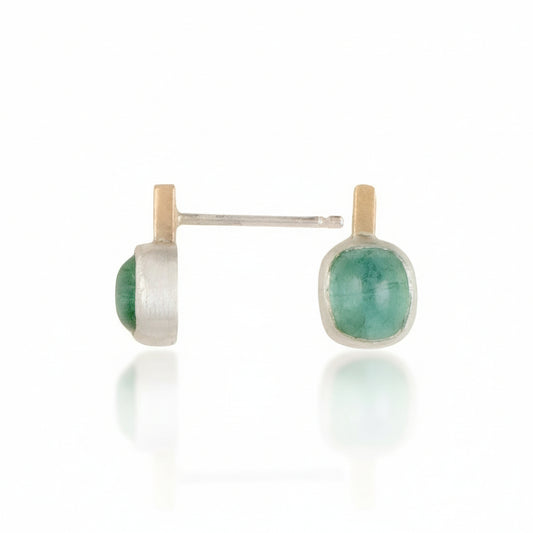 Pair of earrings with green tourmaline gemstones on a white background