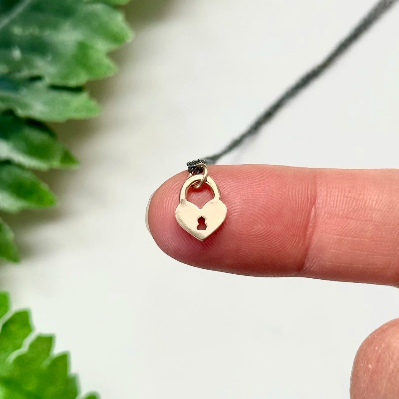 Tiny Heart Lock Necklace – 14k Gold & Oxidized Sterling Silver