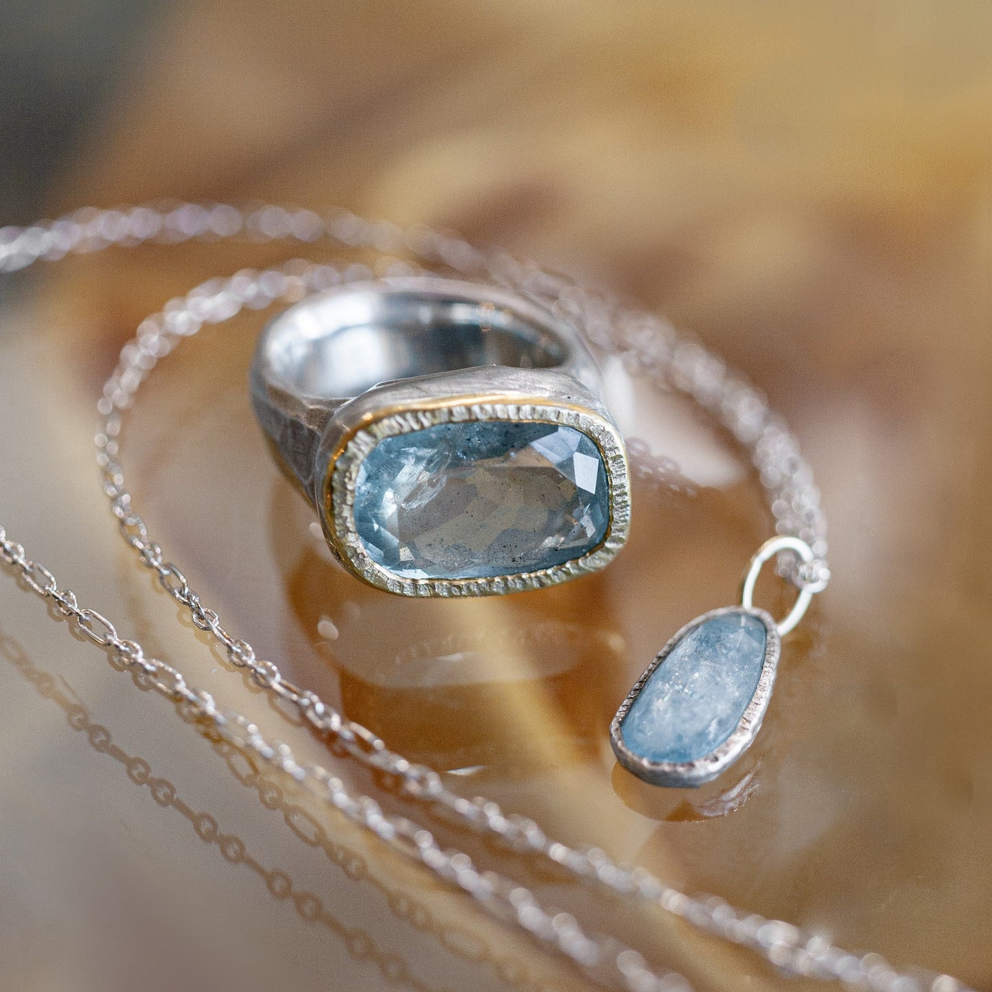 Aquamarine Shine Ring • Sterling Silver • 22k Gold Bezel