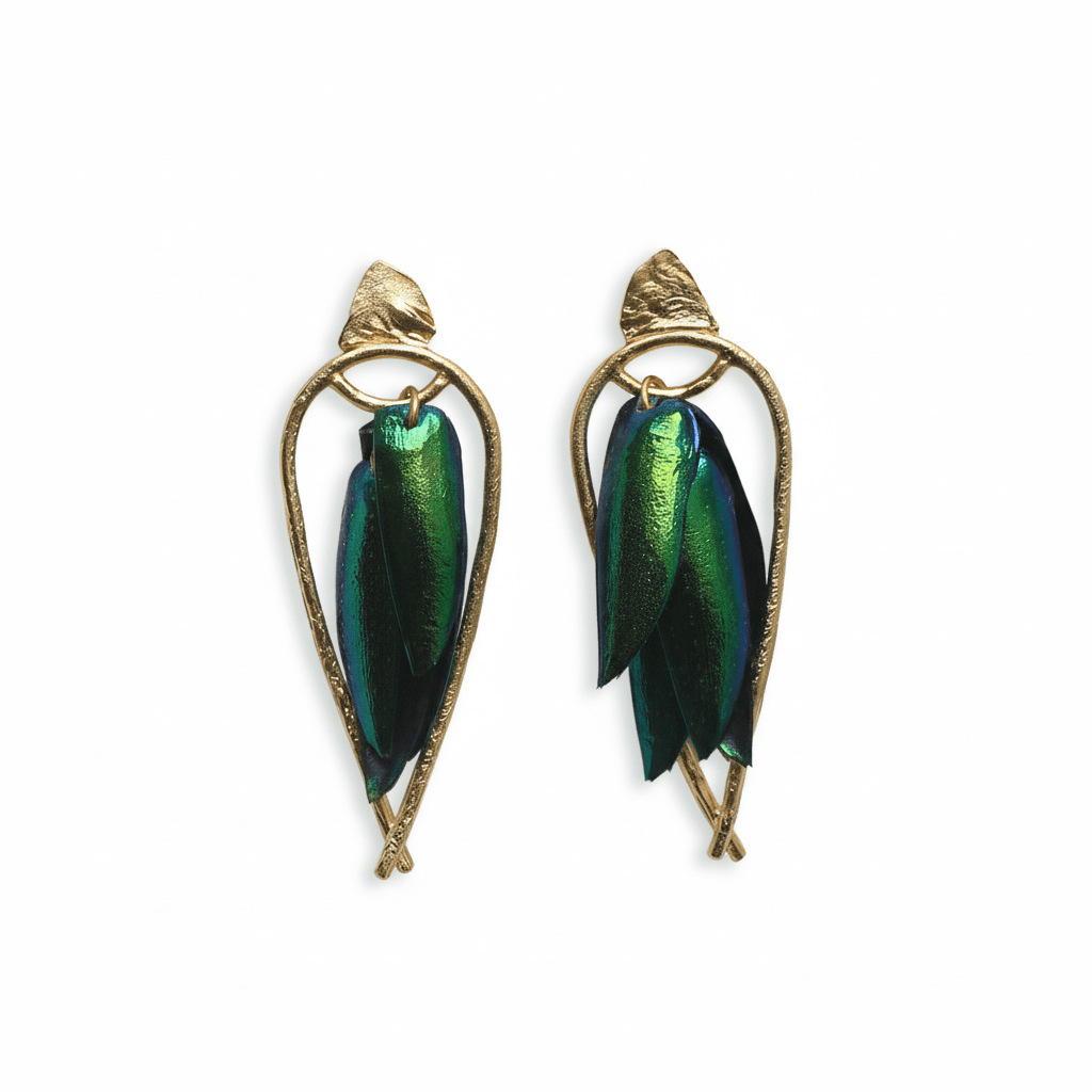 Pair of iridescent green beetle wing earrings with gold-plated brass frames on a white background.