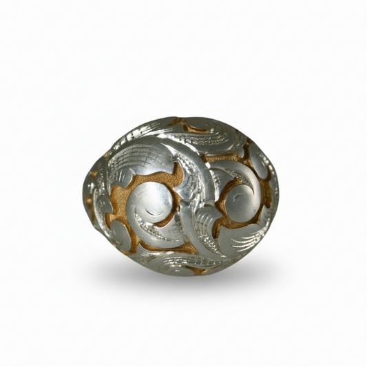 Front view of the Acanthus Bombe Ring in sterling silver with gold accents by Blue Blue Driver on a white background.