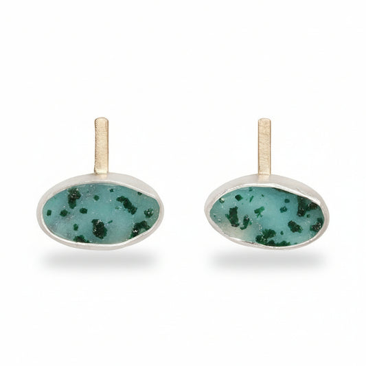 Chrysocolla druzy earrings by Ana Eugenia, featuring oval blue-green gemstones with natural malachite crystals, sterling silver bezels, and 18k yellow gold posts.