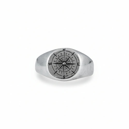 Sterling silver Compass Signet Ring by Alissa Bailey, featuring a finely engraved compass rose on a 12mm wide recycled silver band.