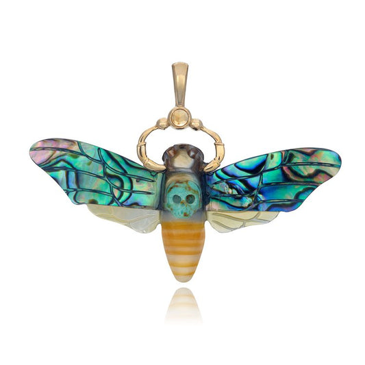Death's Head Hawk Moth charm by Maura Green, hand-carved from abalone, mother of pearl, and turquoise jasper with a citrine gemstone and 14k yellow gold details.