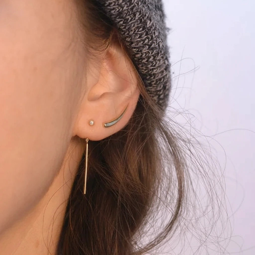 14k gold Diamond Chime Stud styled in ear stack with small talon earring