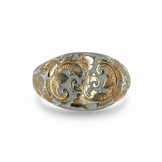 East-West Acanthus Signet Ring by June Cream of Blue Blue Driver, featuring deeply hand-engraved acanthus leaves and scrollwork with 14k yellow gold accents on sterling silver.