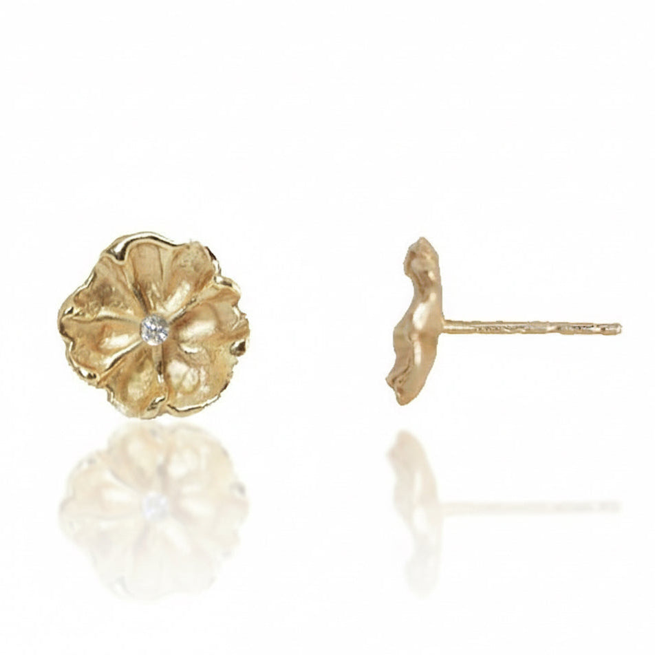 Front and side views of Efflorescent Stud Earrings in recycled 14k yellow gold by Alexis Pavlantos, featuring hand-carved floral petals and a diamond center.