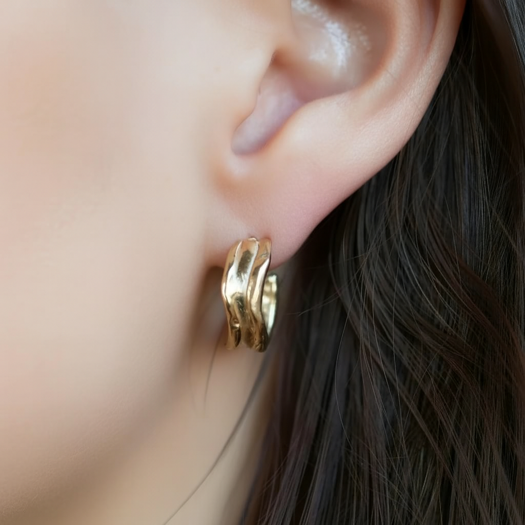 14k gold vermeil Fluvial Hoops worn by model – sculptural organic design