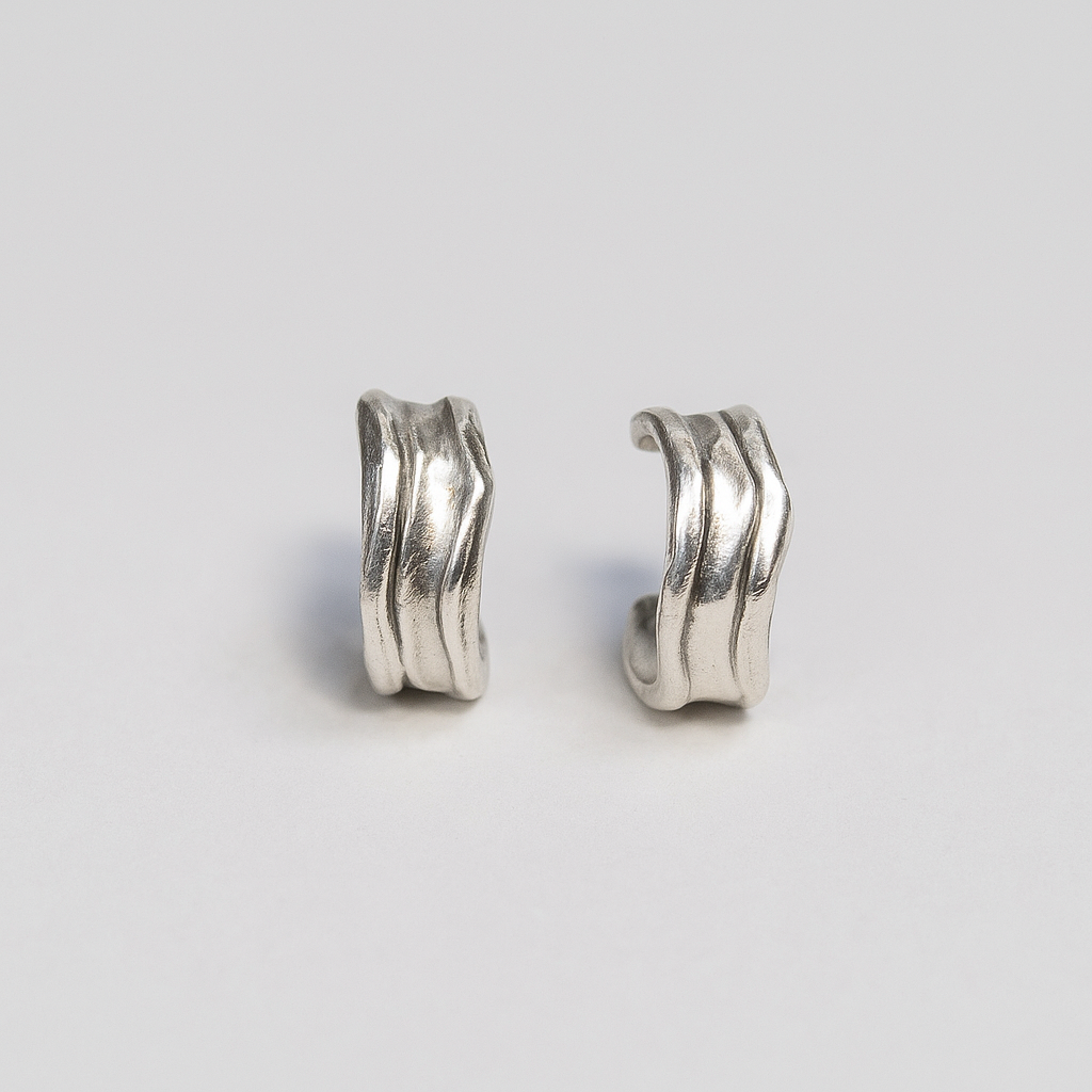 Sterling silver Fluvial Hoops – sculptural modern hoop earrings by Oxbow