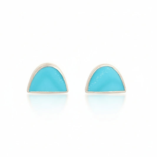Half-Round Turquoise Stud Earrings by Ana Eugenia, featuring vibrant sky-blue turquoise gemstones cut into semicircular shapes and set in polished sterling silver bezels.