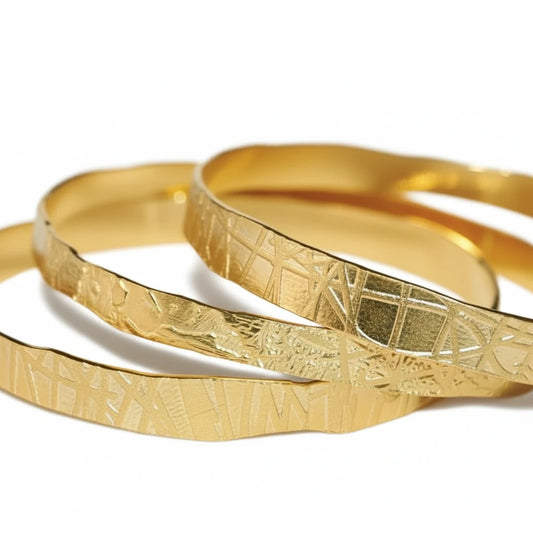 Hand Etched Gold Toned Bangle by Lingua Nigra, featuring textured 22k gold-plated brass bracelets with organic hand-etched patterns.