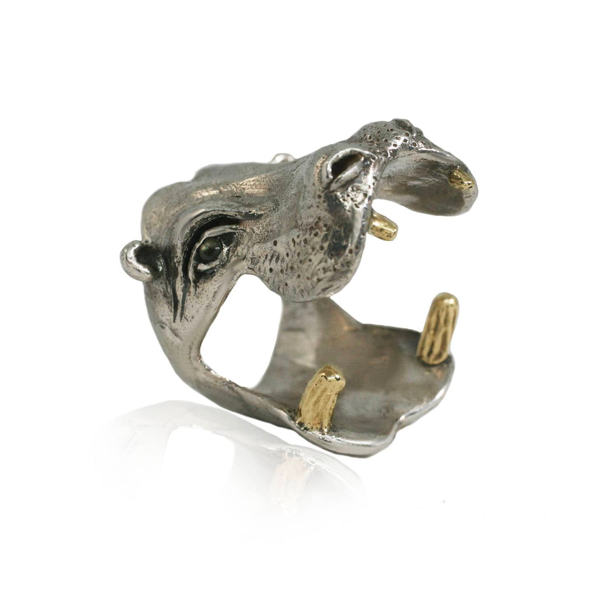 One-of-a-kind sculptural Hippo Ring by Alexis Pavlantos, hand-carved in sterling silver with 14k yellow gold teeth and star sapphire eyes, featuring a detailed hippopotamus head with an open mouth.