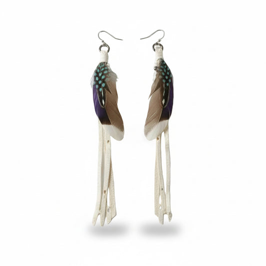 Handmade ivory and black feather drop earrings by Kelly Horrigan featuring layered natural feathers, repurposed leather, subtle blue and green accents, and sterling silver hooks.