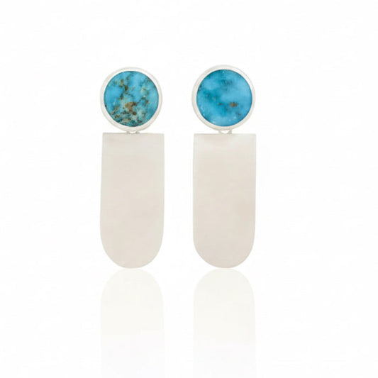 Kara Dangle Earrings by Ana Eugenia, featuring round blue turquoise cabochons with natural matrix and long brushed sterling silver drops.