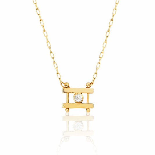 Kiyo Necklace by M. Hisae featuring a reclaimed 2mm brilliant-cut white diamond in a sculptural 14k yellow gold pendant.