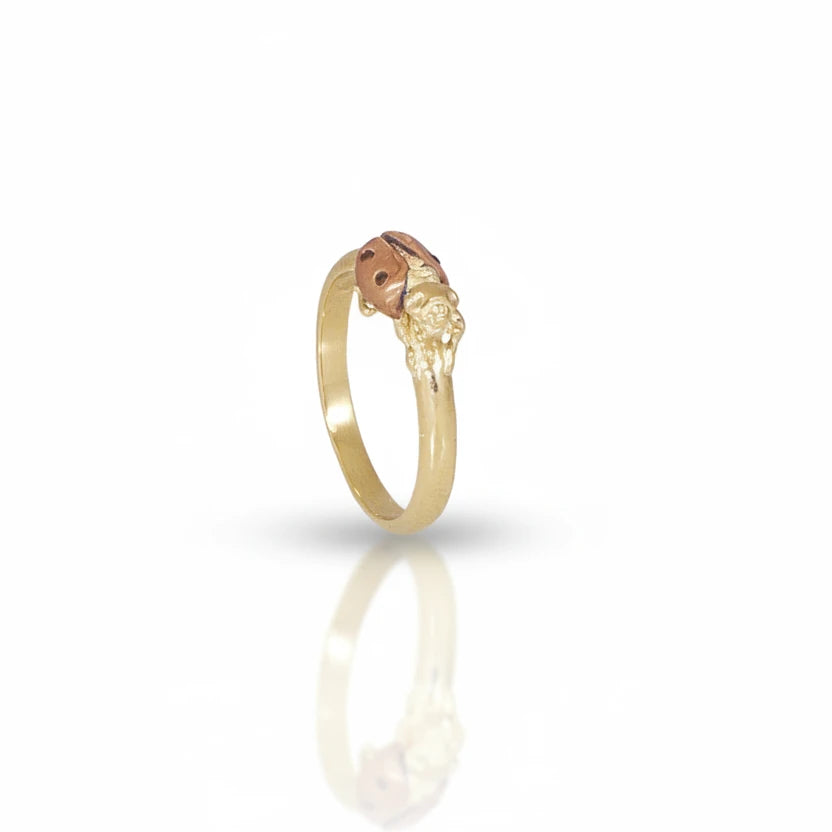 Handcrafted ladybug ring in 14k yellow and rose gold by Alexis Pavlantos, featuring a sculpted rose gold ladybug with three black diamond spots.