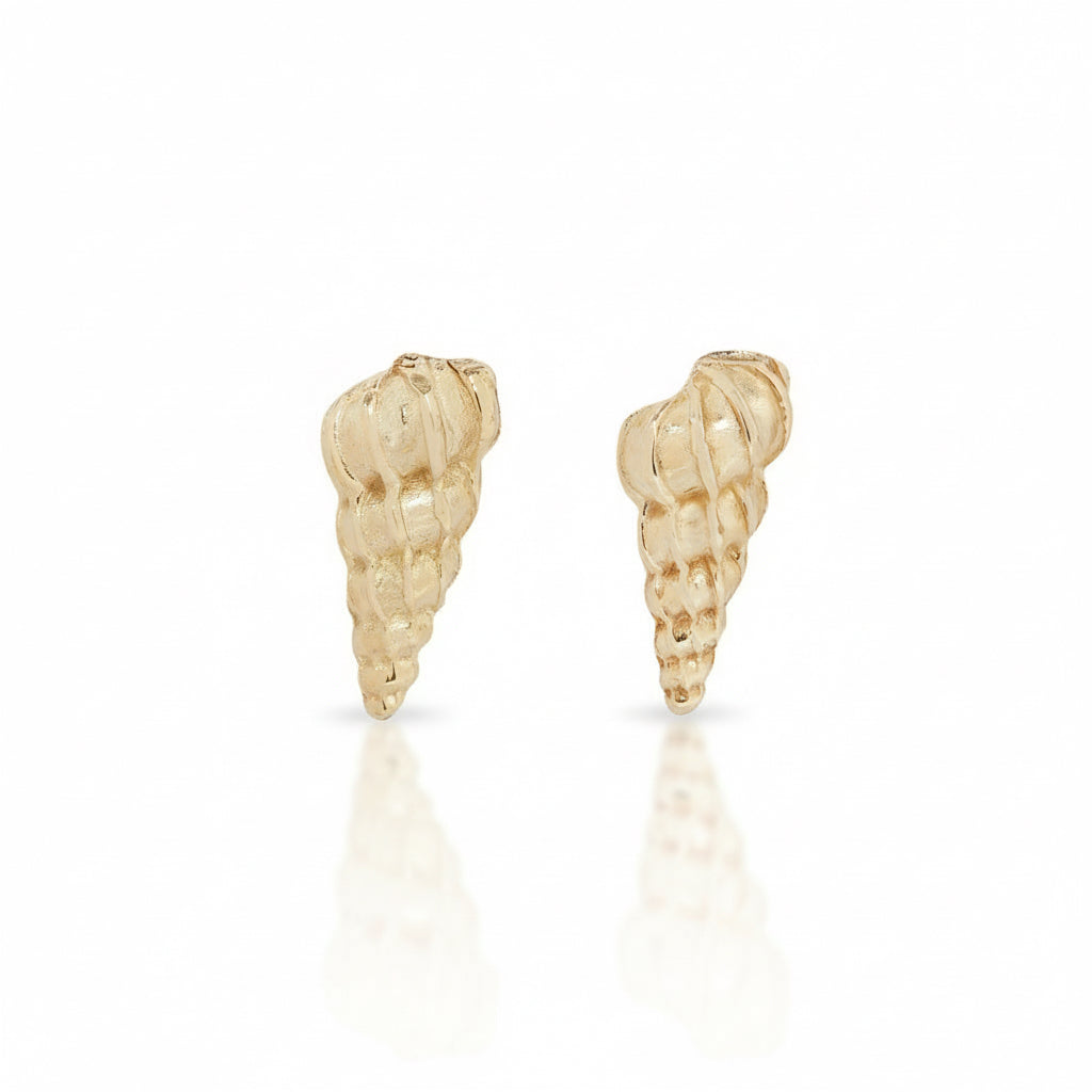 Pair of handcrafted Large Wentletrap Seashell Stud Earrings in solid 14k yellow gold by Alexis Pavlantos, featuring intricate spiral shell textures.