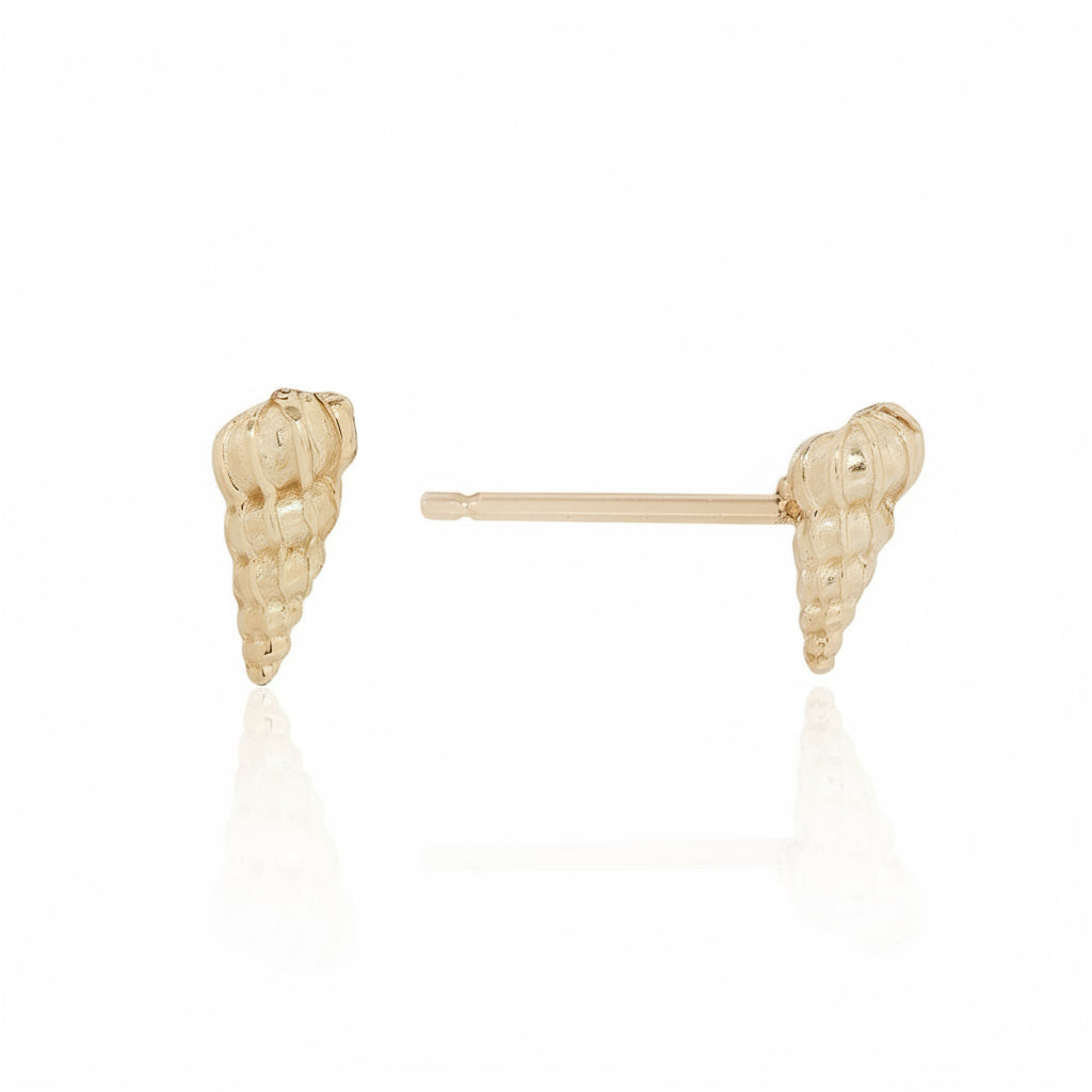 Side profile of 14k yellow gold Wentletrap Seashell Stud Earrings showing hand-carved shell details, three-dimensional spiral shapes, and friction posts.