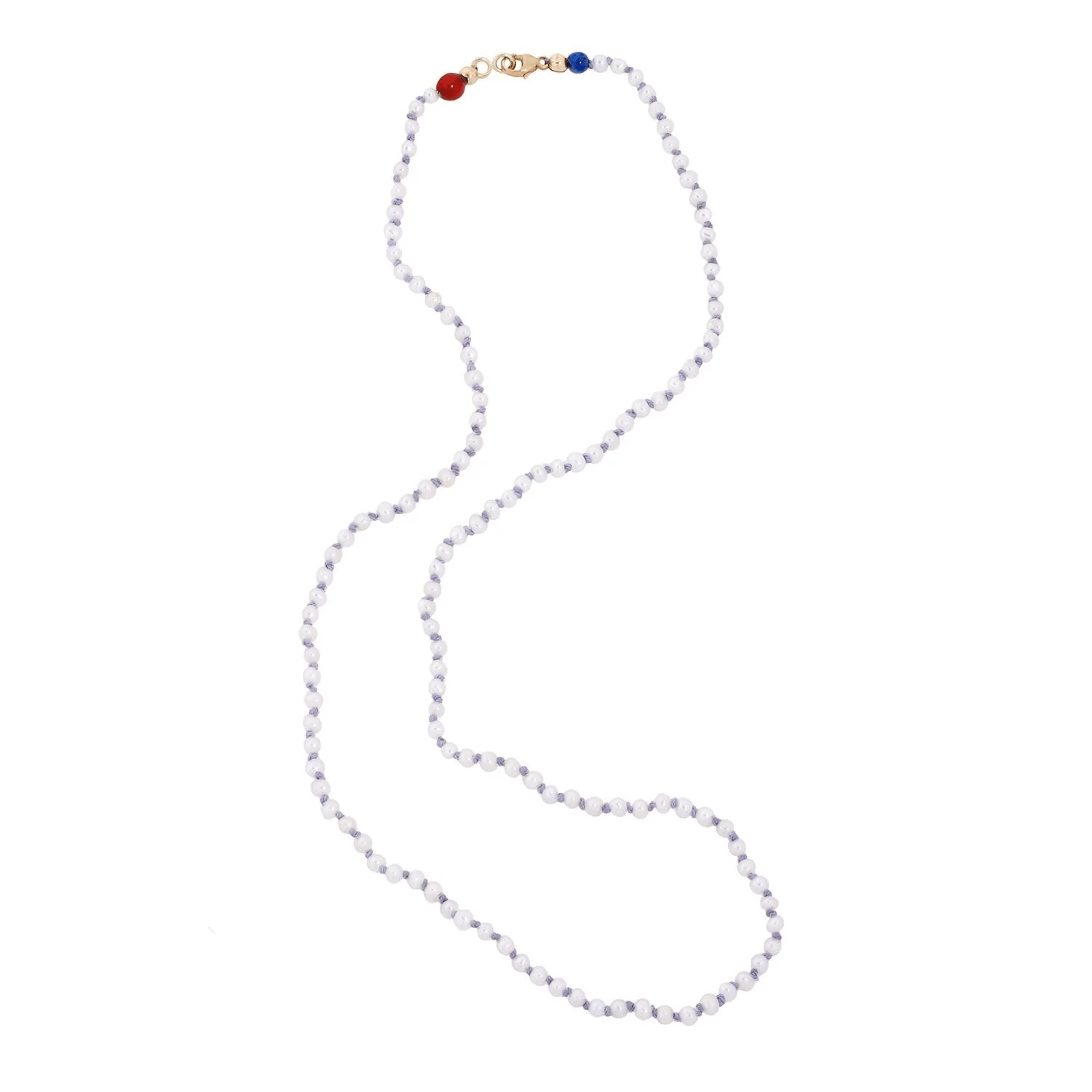 Seed pearl necklace with lilac-toned silk and a gold clasp on a white background.