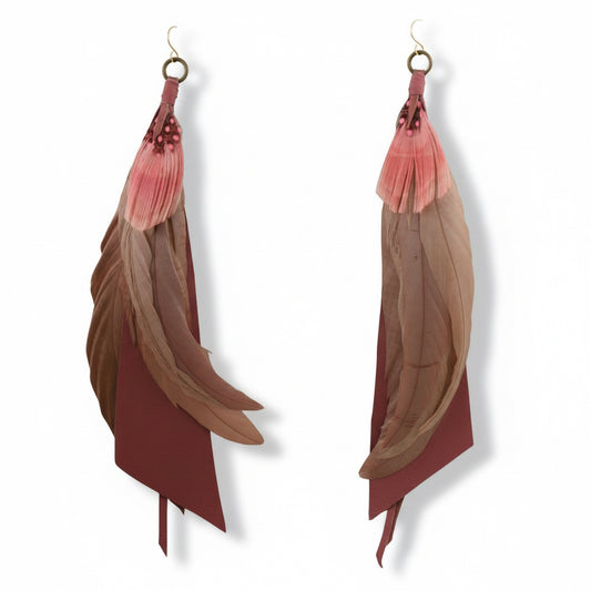 Handmade mauve feather drop earrings by Kelly Horrigan featuring layered natural feathers in dusty rose, blush pink, and warm brown, repurposed leather, and 14k gold-filled hooks.