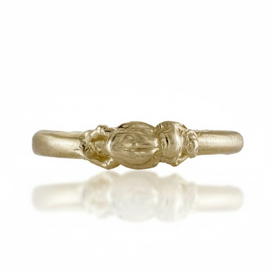 Hand-carved Medium Beetle Stacking Ring in solid 14k yellow gold by Alexis Pavlantos, featuring a detailed sculptural beetle on a delicate gold band.