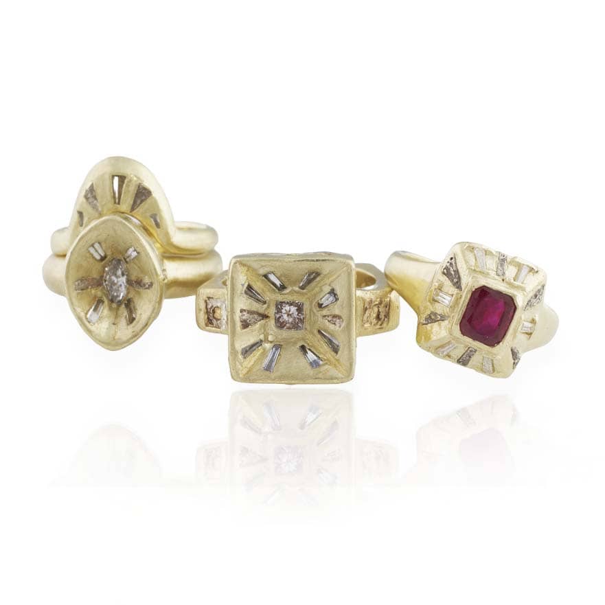 Side-by-side view of the Mesa Ring with two other sculptural gemstone rings by Alexis Pavlantos, highlighting their distinctive handcrafted settings.