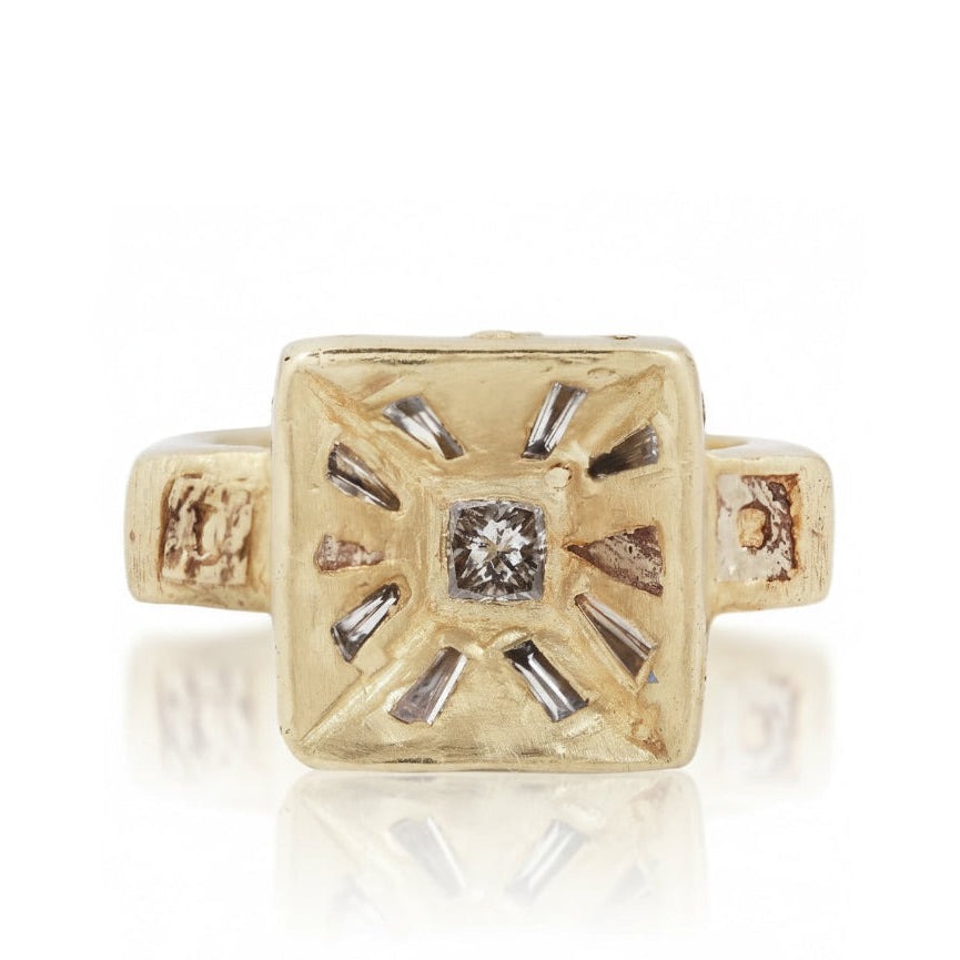 One-of-a-kind Mesa Ring by Alexis Pavlantos in recycled 14k yellow and white gold, featuring a radiant-cut center diamond and baguette diamond accents.
