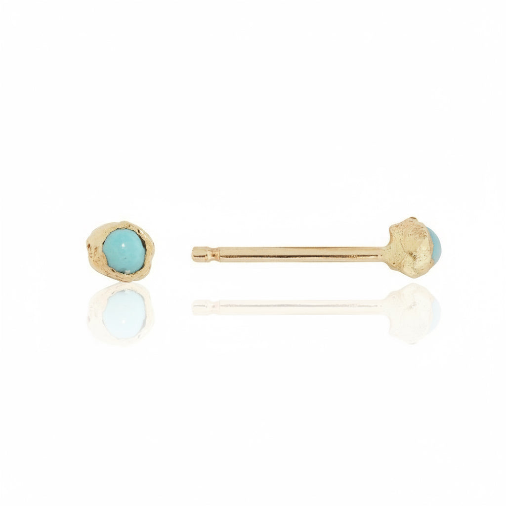 Front and side views of Micro Petra studs featuring 2mm turquoise gemstones in textured 14k yellow gold settings with straight earring posts.