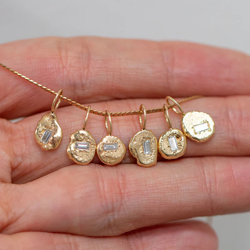 14k gold pendants on a gold chain