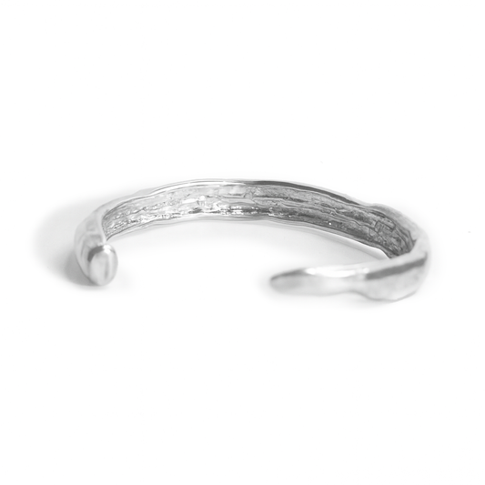 Diablo Cuff by Oxbow, hand cast in solid sterling silver with an open sculptural design inspired by the curved shape of a Diablo pepper.