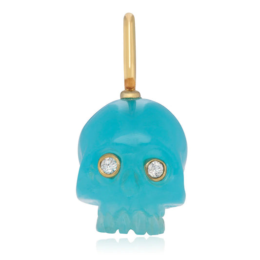 Pacific Blue Chalcedony Skull Baby charm by Maura Green, hand-carved from vibrant blue chalcedony with diamond eyes and 14k yellow gold details.