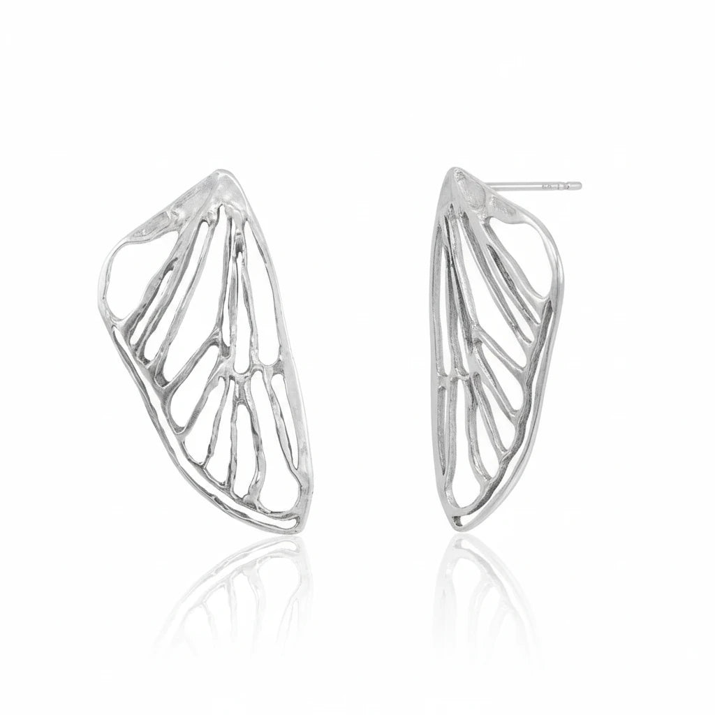 Pair of Petite Cicada Wing Earrings in sterling silver, featuring airy openwork wing patterns inspired by nature and handcrafted by Alexis Pavlantos.