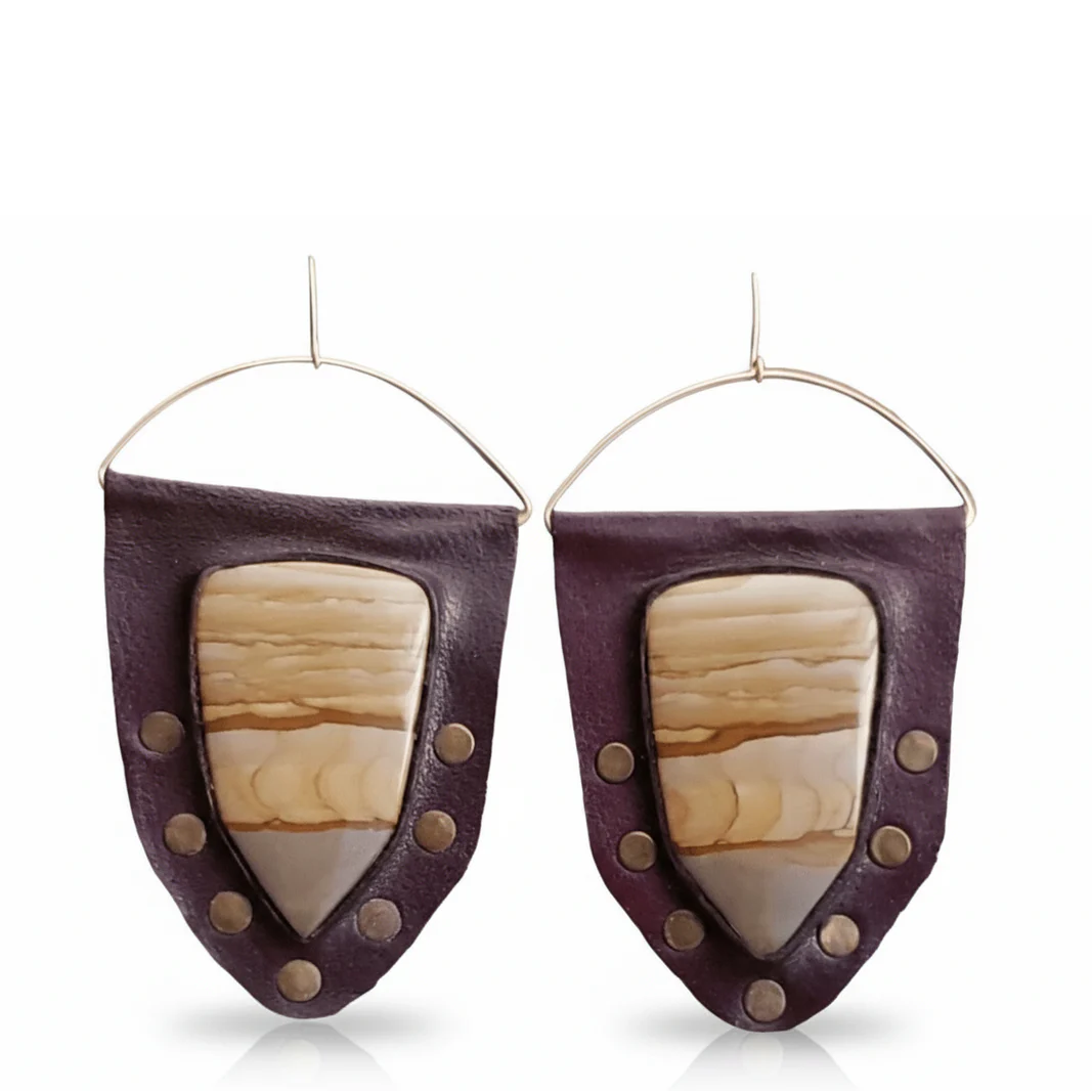 Handcrafted Picture Jasper Shield Earrings by Kelly Horrigan Handmade, featuring natural picture jasper stones set in dark purple hand-tooled leather with 14k gold-filled wire.