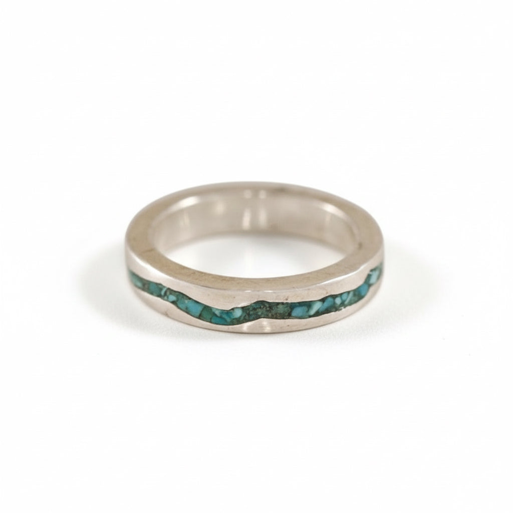 Sterling silver Rio Grande inlay band with crushed turquoise and topographic-inspired design.