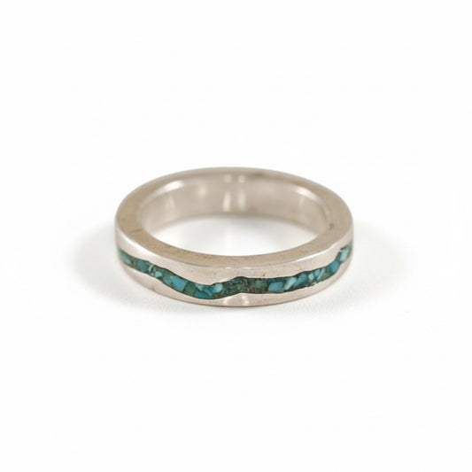 Sterling silver Rio Grande inlay band with crushed turquoise and topographic-inspired design.
