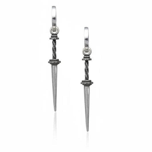 Pair of silver dagger-shaped earrings on a white background