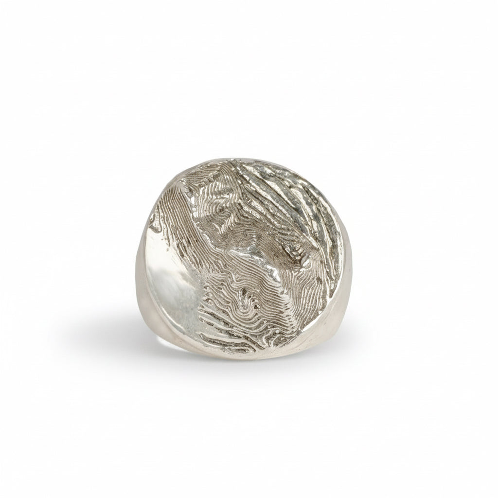 Sterling silver Sandia Crest signet ring showing detailed mountain landscape relief.