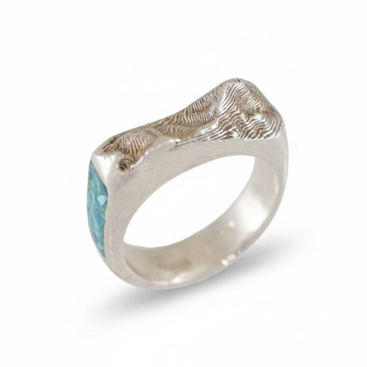 Sterling silver Sandia Crest topo ring with crushed turquoise inlay and sculpted mountain design.