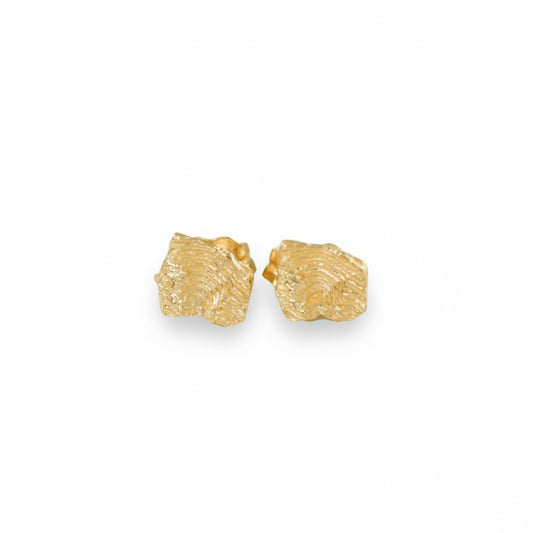 14k yellow gold Sandia Fragmented Stud Earrings by Alissa Bailey, featuring irregular hand-sculpted textures inspired by New Mexico's Sandia Mountains.