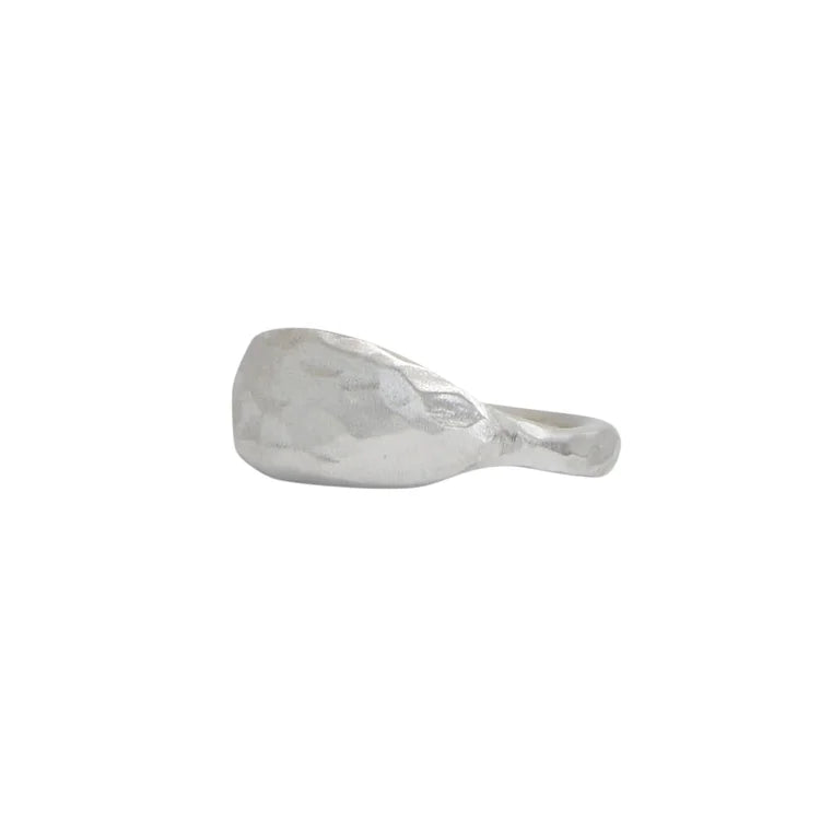 Angled side view of Shaya Durbin's Carved Marquise Signet Ring highlighting its low sculptural silhouette and smooth recycled sterling silver shank.