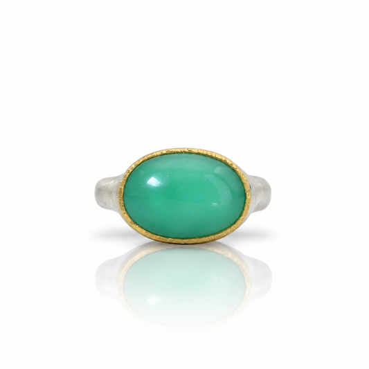 Chrysoprase Shine Ring by Shaya Durbin featuring a vivid Crayola green chrysoprase cabochon in a 22k yellow gold bezel on recycled sterling silver.