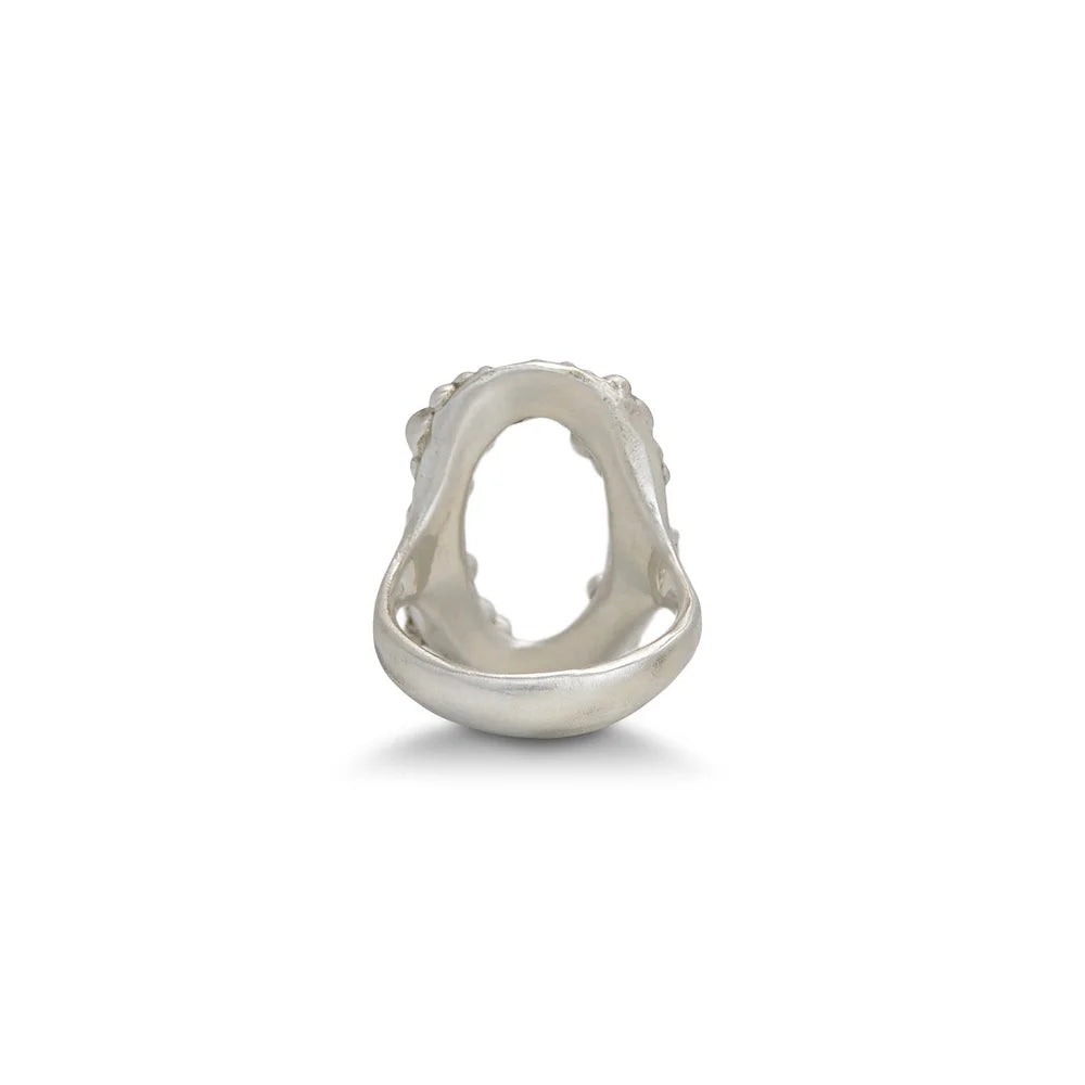 Back view of the Cluster Circle Ring by Shaya Durbin, highlighting its irregular circular silhouette and dimensional recycled sterling silver texture.